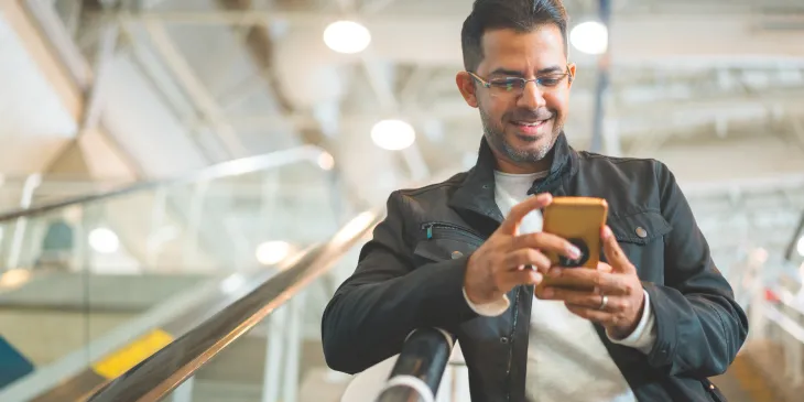 Man looking at his cell phone