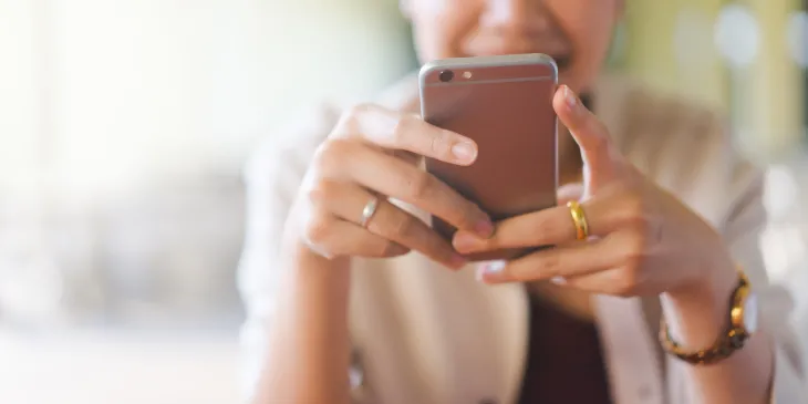 Woman looking at mobile phone