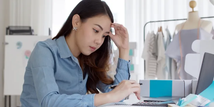 business owner looking at computer