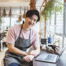 Business owner using his computer