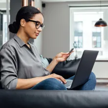 Woman making online payment - Extraco Banks