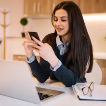 Woman making loan payment