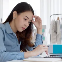 business owner looking at computer